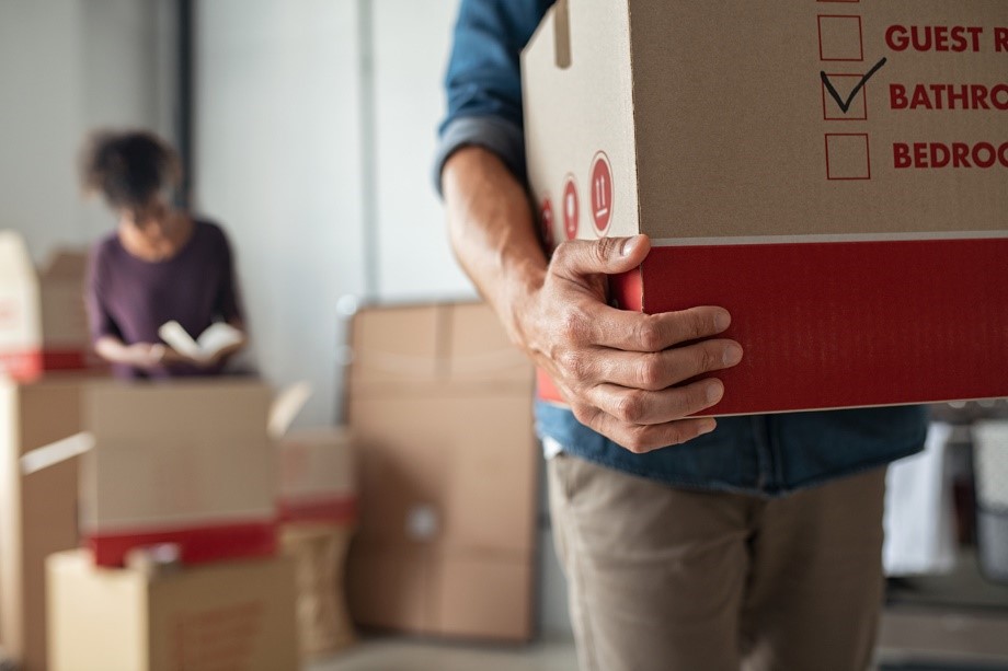 Man holding packing boxes