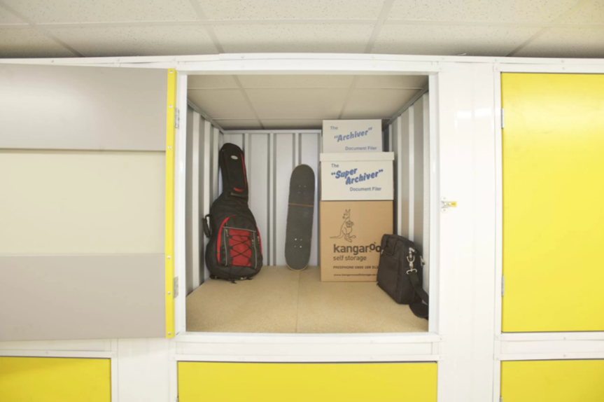 small storage unit with boxes inside